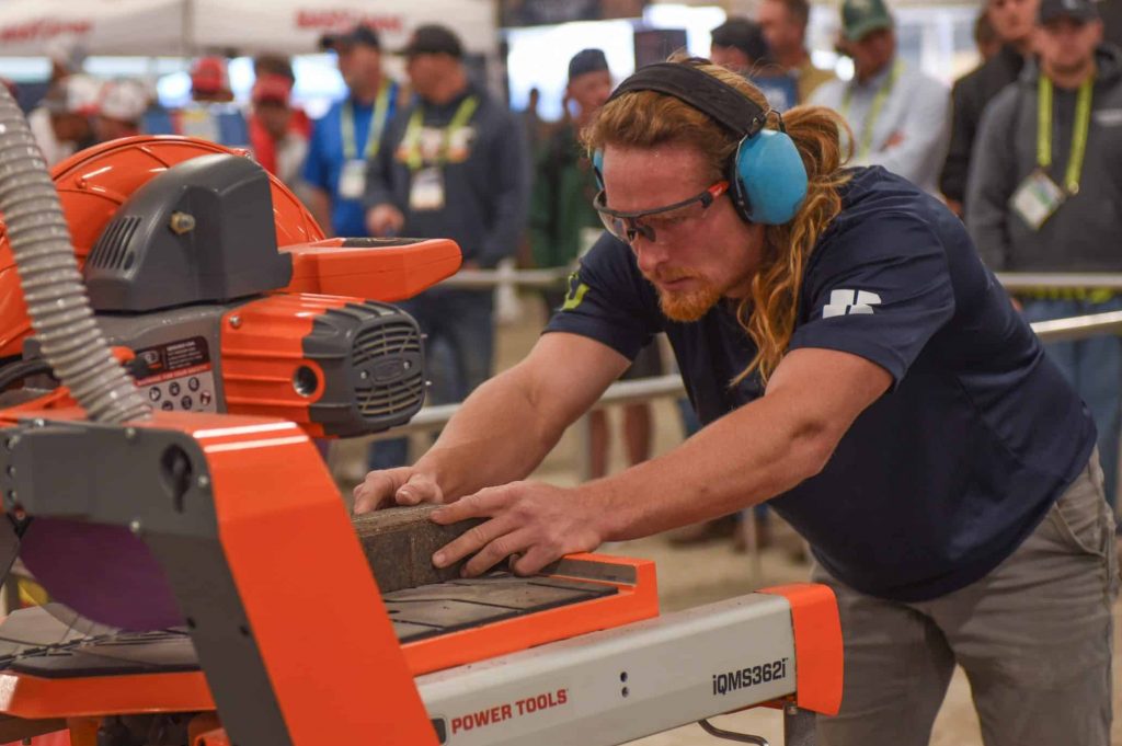 Contractor using saw