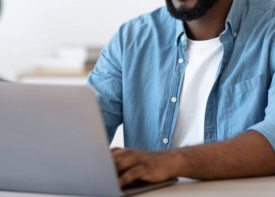 African American man on laptop