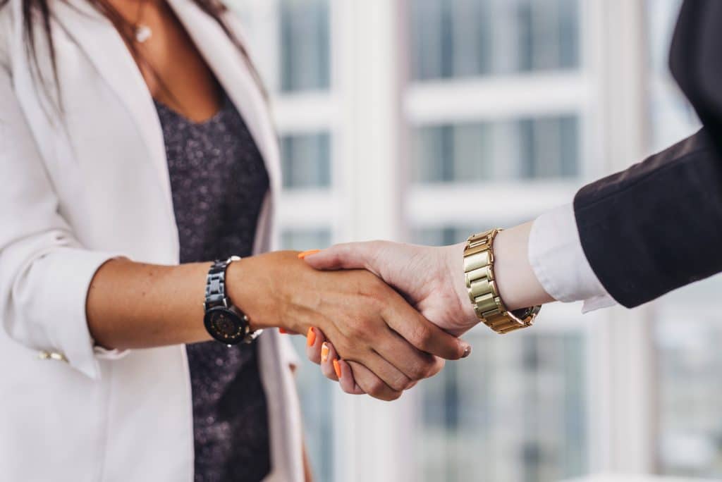 Women shaking hands